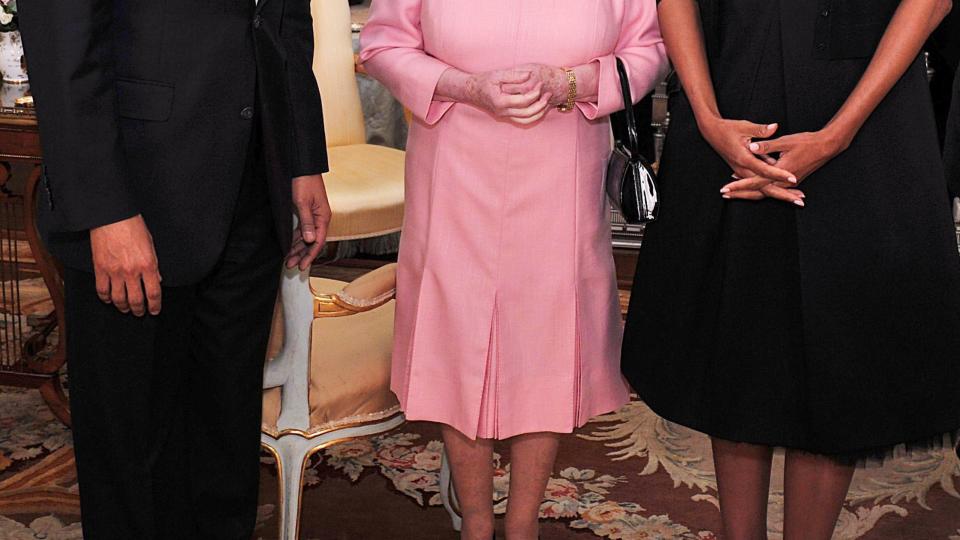 president obama and the first lady meet the queen