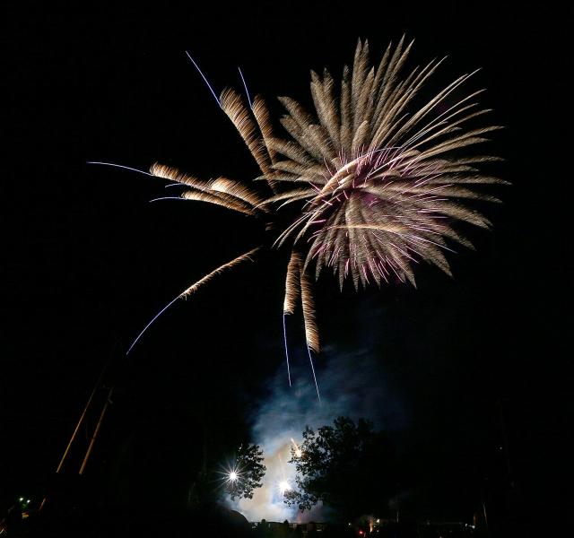 People view fireworks from parking lots and churches near Ashland