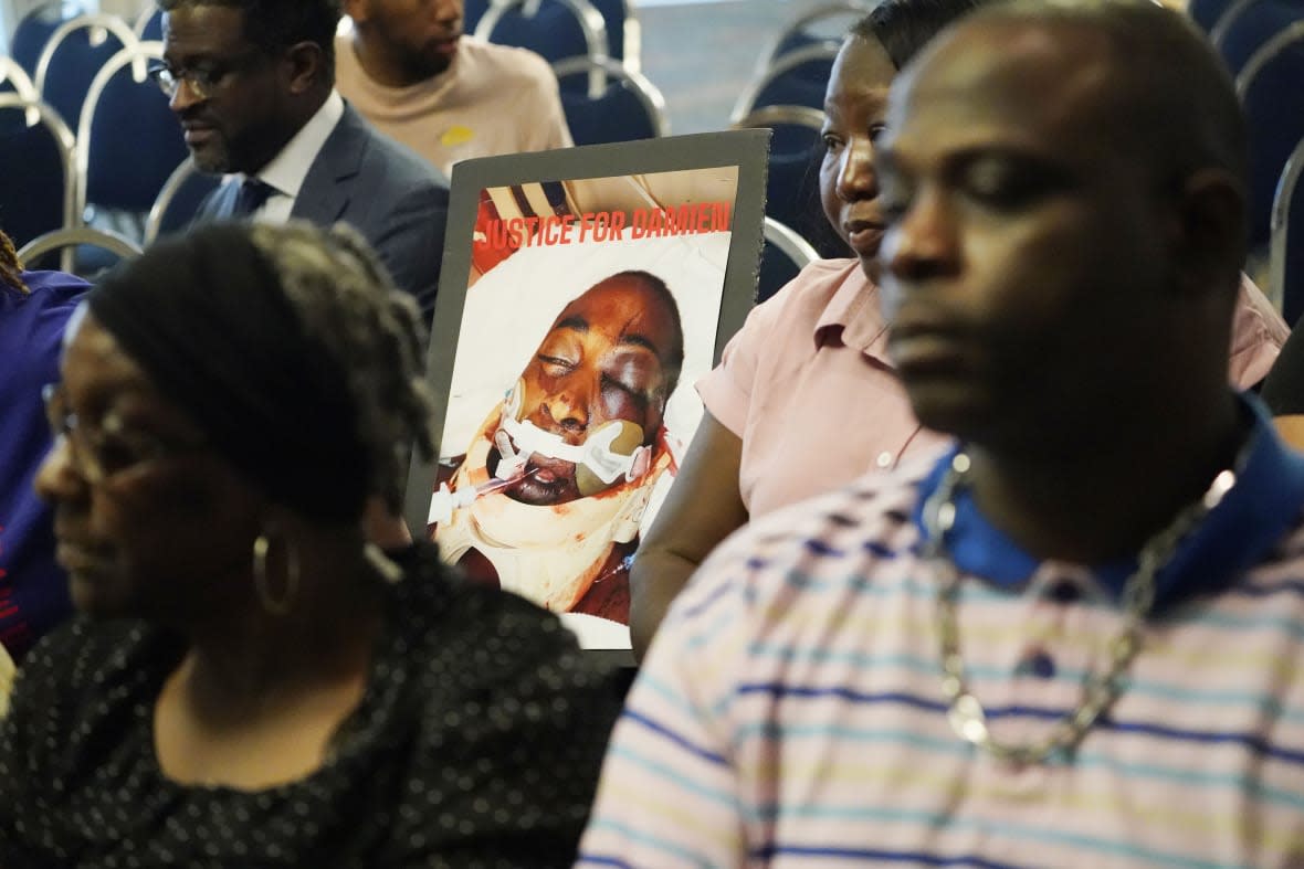 The families of Michael Corey Jenkins and Damien Cameron sit together prior to interacting with U.S. Assistant Attorney General Kristen Clarke of the Justice Department’s Civil Rights Division, unseen, during the Jackson, Miss., stop on the division’s civil rights tour, June 1, 2023. Jenkins, who was shot in the mouth by Rankin County deputies, is at the center of a federal civil rights probe into the sheriff’s office. Cameron died after getting arrested by deputies from the same sheriff’s office. Mississippi is the latest stop in Clarke’s “listening tour” throughout the Deep South. (AP Photo/Rogelio V. Solis)