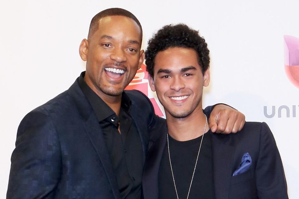 <p>Gabe Ginsberg/WireImage</p> Will Smith and Trey Smith pose at the 16th Latin GRAMMY Awards in 2015