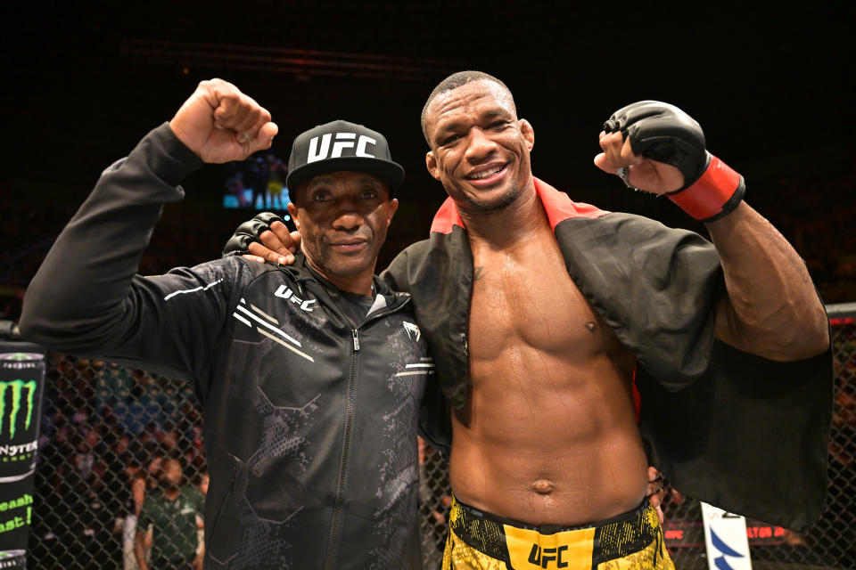 Jailton Almeida (right) celebrates with his father after defeating Derrick Lewis in a heavyweight fight at UFC Fight Night on November 04, 2023 in Sao Paulo, Brazil. (Photo by Pedro Vilela/Zuffa LLC via Getty Images)