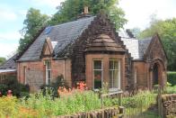 <p>This traditional baronial lodge house has breathtaking <a href="https://www.housebeautiful.com/uk/garden/designs/g33976949/garden-outdoor-trend-predictions/" rel="nofollow noopener" target="_blank" data-ylk="slk:gardens;elm:context_link;itc:0;sec:content-canvas" class="link ">gardens</a>, colourful flowerbeds, a large bright living room, covered patio area, three bedrooms and an entrance vestibule. Better still, it's for sale by public auction with a £140,000 guide price...</p><p><a href="https://www.onthemarket.com/details/9550470/" rel="nofollow noopener" target="_blank" data-ylk="slk:This property is currently on the market for £140,000 with Town & Country Property Auctions Scotland at OnTheMarket;elm:context_link;itc:0;sec:content-canvas" class="link ">This property is currently on the market for £140,000 with Town & Country Property Auctions Scotland at OnTheMarket</a> </p>