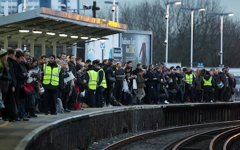 Commuters wait for a Southern train at Clapham Junction during rail strikes in January 2017 - Credit: Getty