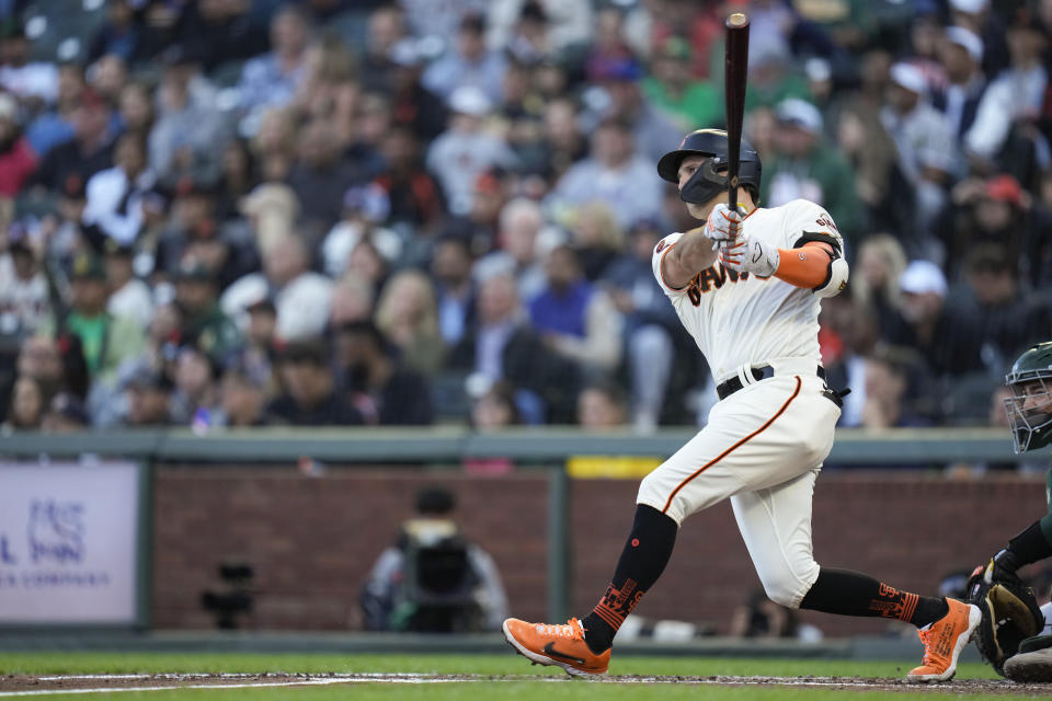 San Francisco Giants' Casey Schmitt watches his RBI double against the Oakland Athletics during the second inning of a baseball game, Wednesday, July 26, 2023, in San Francisco. (AP Photo/Godofredo A. Vásquez)