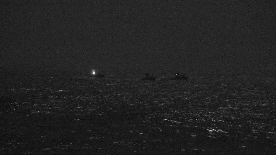Three Iranian Islamic Revolutionary Guard Corps Navy (IRGCN) fast inshore attack craft (FIAC) approach the U.S. Coast Guard patrol boat USCGC Baranof (WPB 1318) and patrol coastal ship USS Firebolt (PC 10)