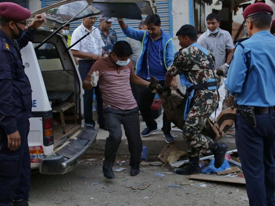 Three people have been killed and six others injured in two explosions in Kathmandu.Although no group has yet claimed responsibility for the blasts, local police suspect a splinter group of Maoist rebels may be behind the deadly explosions.The first suspected bombing took place inside a house in the Ghattekulo district in the south of the Nepalese capital and killed one person.Local eyewitnesses reported the force of the blast was so great it cracked the walls of the home.The second explosion took place about an hour later outside a hairdresser in the Sukedhara neighbourhood, several miles further north.Two people were killed in this second blast and a further six injured, who have all been taken to hospital.The second explosion was powerful enough to shatter both the windowpanes and the door of the shop.Police official Shyam Lal Gyawali said an investigation into the cause of the twin explosions was still under way, but told Reuters news agency the working theory was a small splinter group of Maoist rebels was responsible."A pamphlet from the group has been found at the site of the first blast," he said. One of those injured is a member of the rebels and the home damaged in the first explosion was being used to construct crude improvised explosive devices, he added.Although the bulk of the communist rebels who fought a long civil war in Nepal have since joined the ruling party, a breakaway group has been opposed to the government, which has been arresting some of its supporters.An explosion in Kathmandu in February – which killed one person and injured two others – is also believed to have been carried out by the splinter group.A spokesman for the Nepali army said one of its bomb disposal units had been dispatched to the Lalitpur suburb of the capital in response to reports a suspicious pressure cooker covered in tape had been seen near a bus terminal.