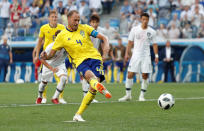 <p>Spot on: Andreas Granqvist scores their first goal from a penalty. (REUTERS/Murad Sezer) </p>