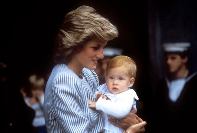 The Princess of Wales carries baby Prince Harry