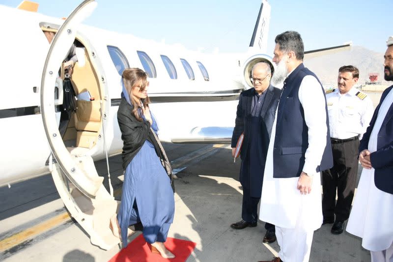 Pakistan's Minister of State Hina Rabbani Khar, greets Ubaid-ur-Rahman Nizamani, head of Mission of Embassy of Pakistan, upon her arrival in Kabul