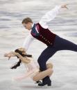 Madison Chock and Evan Bates of the United States compete in the ice dance free dance figure skating finals at the Iceberg Skating Palace during the 2014 Winter Olympics, Monday, Feb. 17, 2014, in Sochi, Russia. (AP Photo/Bernat Armangue)