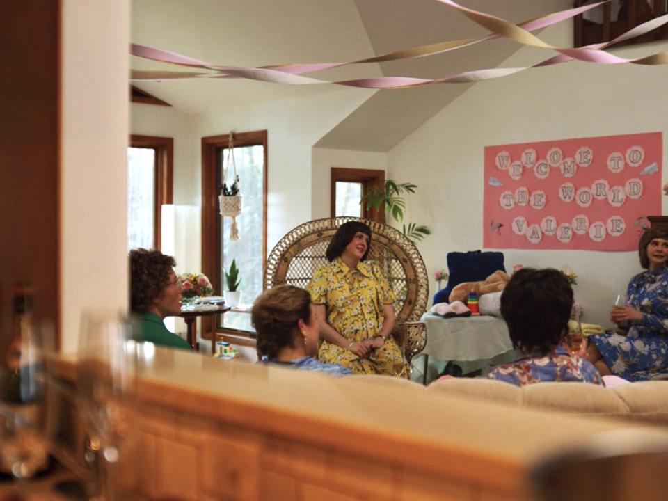 Betty (Melanie Lynskey), center, at her baby shower on Hulu's "Candy."