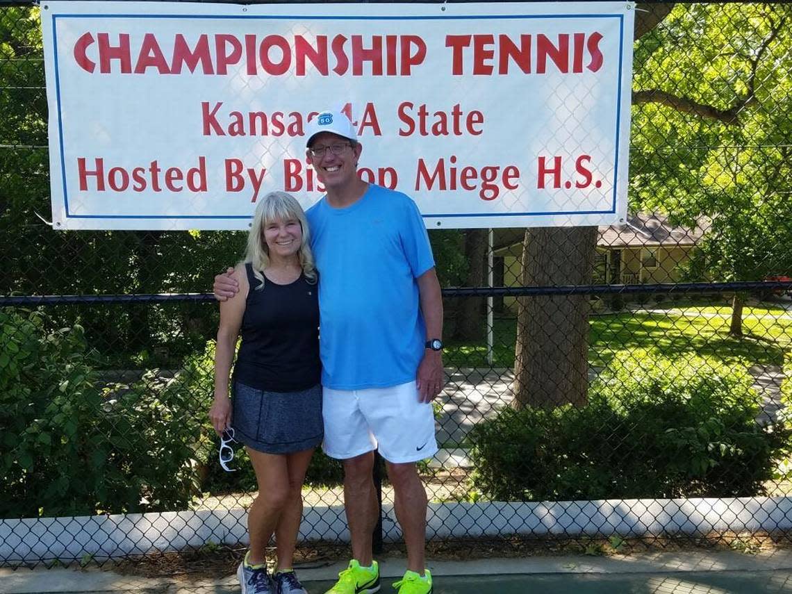 Janet Glaser, a long-time assistant, poses with Collegiate coach Dave Hawley, who won his 50th state championship at Collegiate on Saturday.