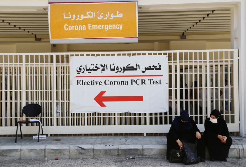 Women wait to get tested for the coronavirus disease (COVID-19), at Rafik Hariri University Hospital in Beirut