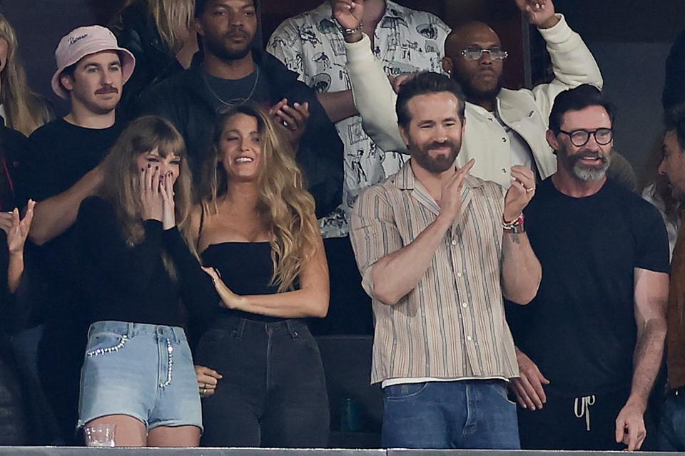 Taylor Swift, Blake Lively, Ryan Reynolds and Hugh Jackman react during the first quarter of Travis Kelce's Kansas City Chiefs game against the New York Jets.