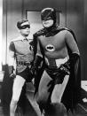 <p>Burt Ward, left, and Adam West pause in a still from the television series “Batman,” circa 1967. (Photo: 20th Century Fox/Getty Images) </p>