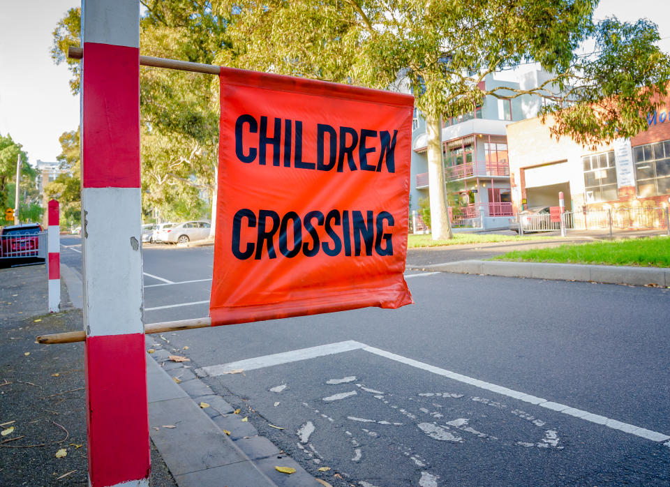 Children's road crossing sign.