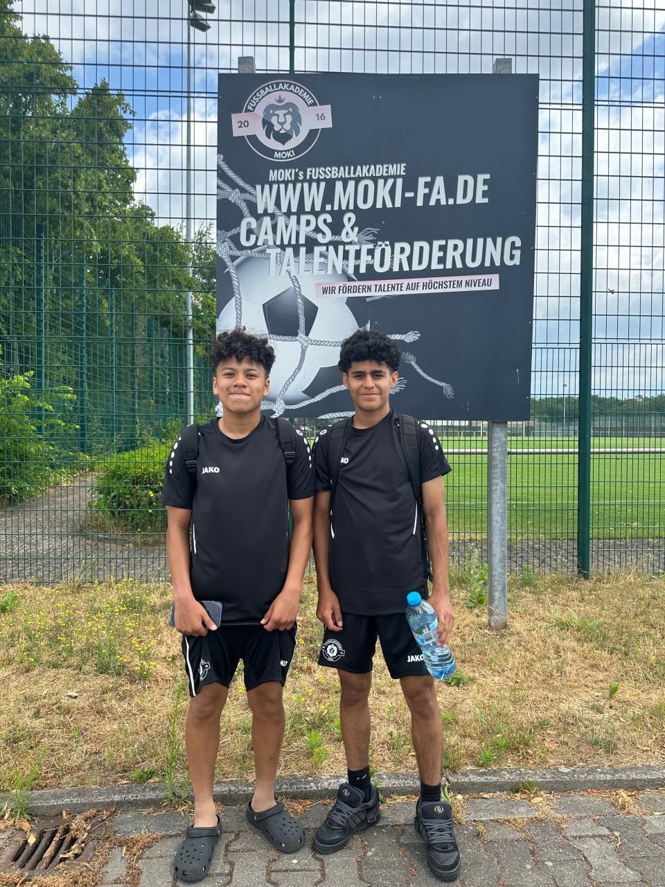 Angelo Vieyra (left) and Giovanni Medina (right) pose for a photo during one of their days at the Moki Fussballakademie soccer youth trial in Germany.