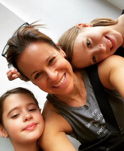 Jenna Wolfe with daughters Quinn, 8 (left) and Harper, 9.