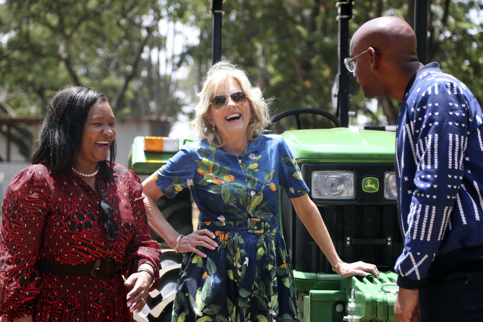 U.S. first lady Jill Biden, center, visits Hello Tractor, an organization connecting tractor owners and smallholder farmers, in Nairobi, Kenya, Saturday, Feb. 25, 2023. (AP Photo/Brian Inganga)