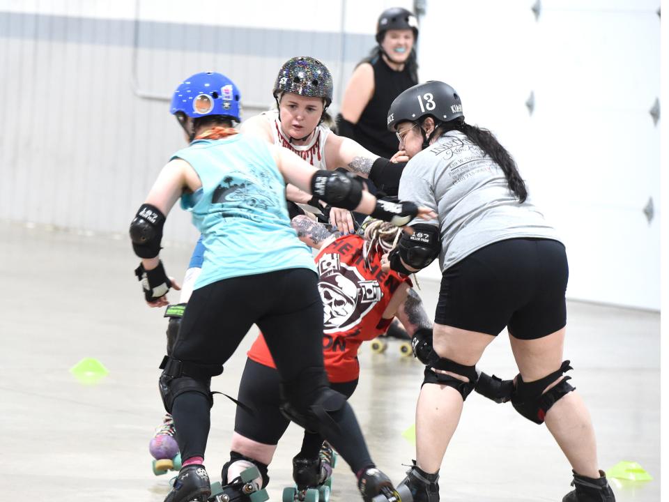 The Rocktown Rollers practice at the Rockingham County Fairgrounds Thursday, Feb. 9. The roller derby team is based in Harrisonburg.