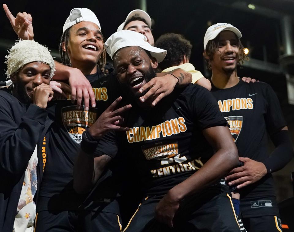 Mar 7, 2023; Indianapolis, IN, USA;  Northern Kentucky Norse guard Trevon Faulkner (22) celebrates with his teammates after defeating the Cleveland State Vikings to win the Horizon League Championship at Indiana Farmers Coliseum.