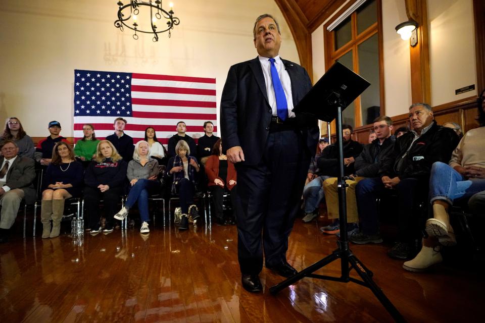 Republican presidential candidate Chris Christie announces he is dropping out of the race during a town hall campaign event in Jan. 10 in Windham, N.H.