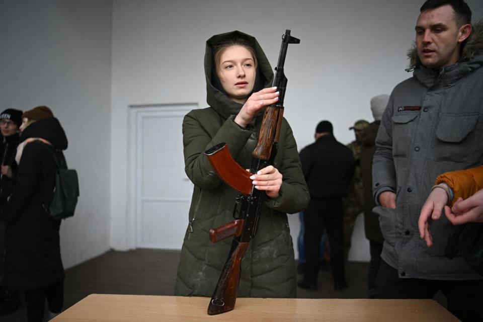 <div class="inline-image__caption"><p>A young woman learns how to use an AK-47 assault rifle during a civilians’ self-defense course on the outskirts of Lviv, western Ukraine, on March 4, 2022.</p></div> <div class="inline-image__credit">Daniel Leal/AFP via Getty Images</div>