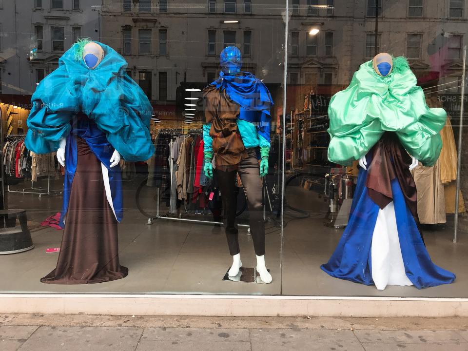 Francesco Colucci styles the windows of Traid by repurposing donated clothes and glitzy fabrics.