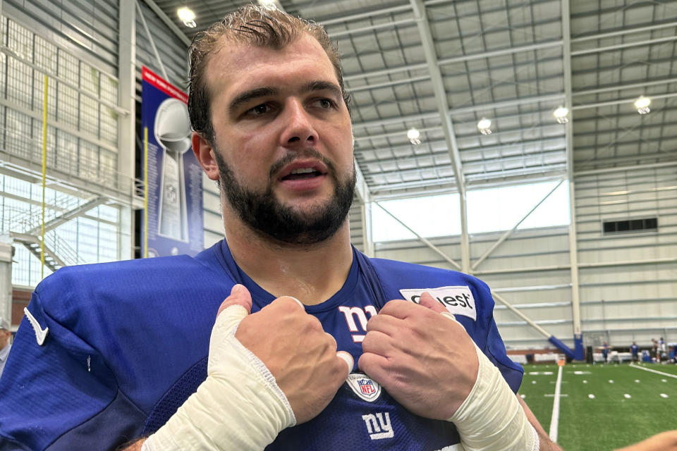 New York Giants offensive lineman Ben Bredeson speaks with reporters after NFL football practice, Wednesday, Aug. 16, 2023, in East Rutherford, N.J. Since the Giants opened training camp in late July, Bredeson has played center, left guard and right guard. (AP Photo/Tom Canavan)