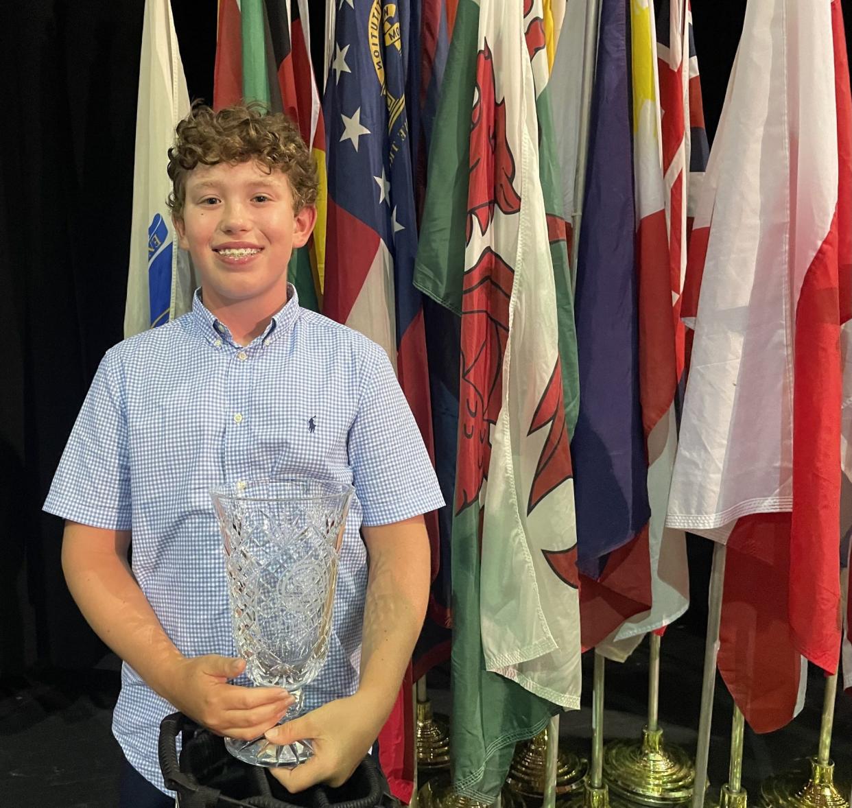 Matthew Marigliano holds the championship trophy after winning the 12-year-old Boys division at the US Kids Golf World Championship at Pinehurst, N.C.