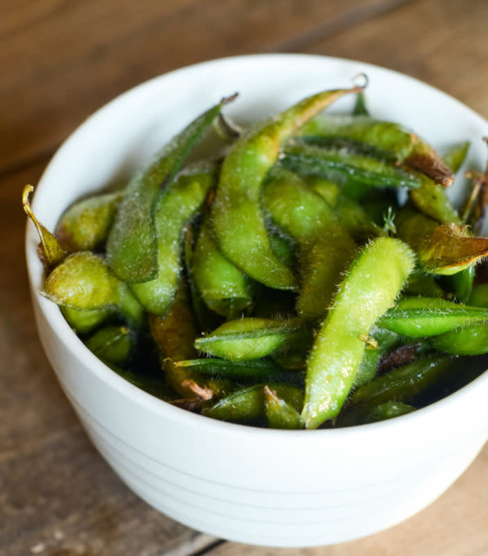 <p>Air Fryer Fanatics</p><p>This air fryer roasted edamame is a great, quick low-calorie snack.</p><p><strong>Get the recipe: <a href="https://airfryerfanatics.com/air-fryer-roasted-edamame/" rel="nofollow noopener" target="_blank" data-ylk="slk:Air Fryer Roasted Edamame;elm:context_link;itc:0;sec:content-canvas" class="link ">Air Fryer Roasted Edamame</a></strong></p>