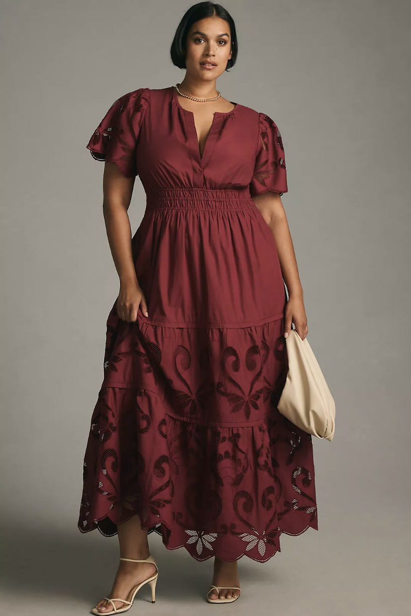 plus size model wearing wine red The Somerset Maxi Dress: Cutwork Edition (photo via Anthropologie)