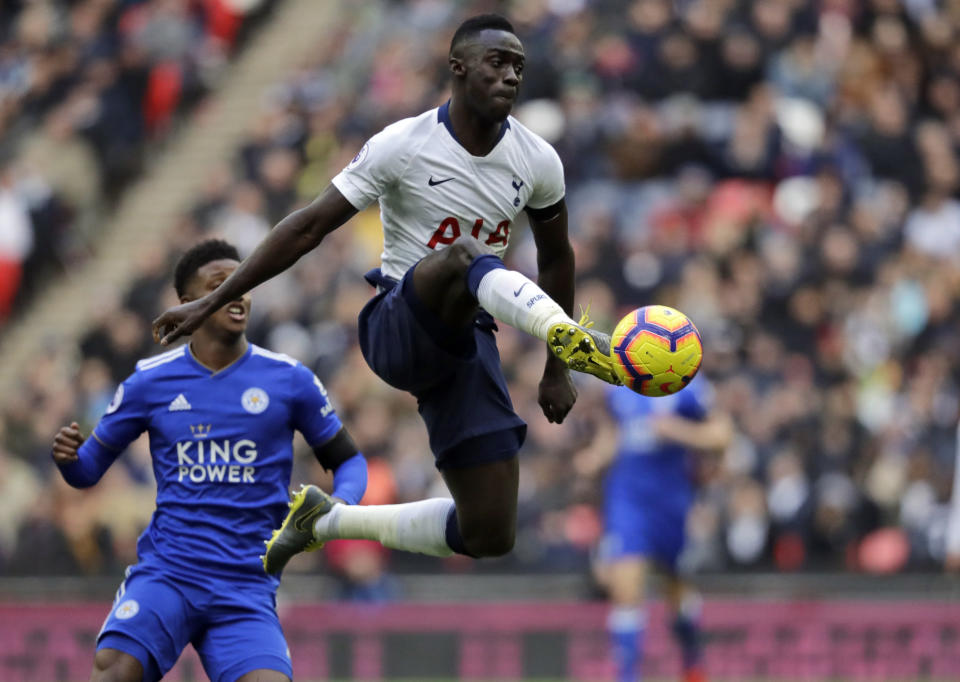 Tottenham Hotspur's Davinson Sanchez kicks the ball during the English Premier League soccer match between Tottenham Hotspur and Leicester City at Wembley stadium in London, Sunday, Feb. 10, 2019. (AP Photo/Matt Dunham)