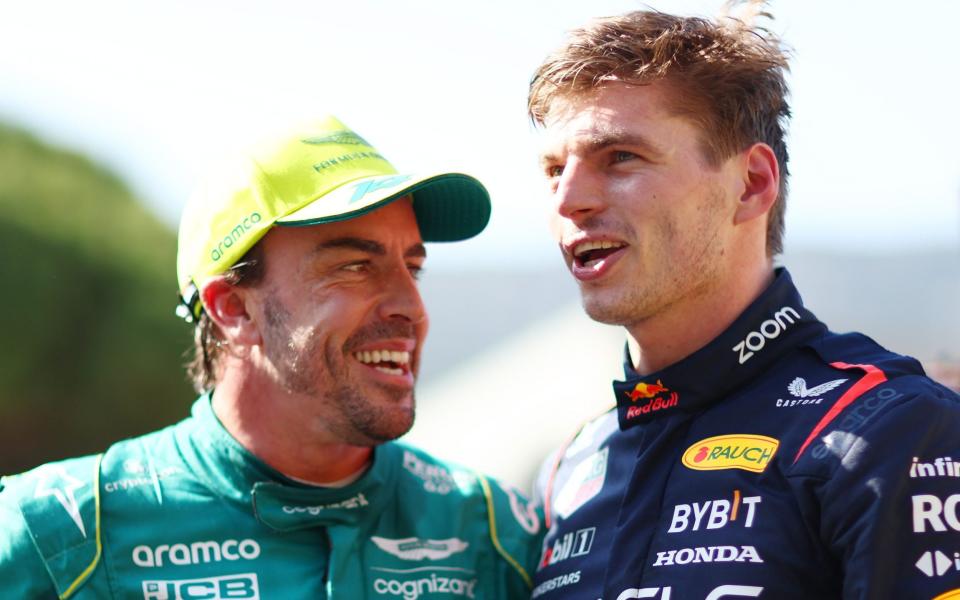 Pole position qualifier Max Verstappen of the Netherlands and Oracle Red Bull Racing and Second placed qualifier Fernando Alonso of Spain and Aston Martin F1 Team talk in parc ferme during qualifying ahead of the F1 Grand Prix of Monaco at Circuit of Monaco on May 27, 2023 in Monaco, Monaco - Getty Images/Dan Istitene