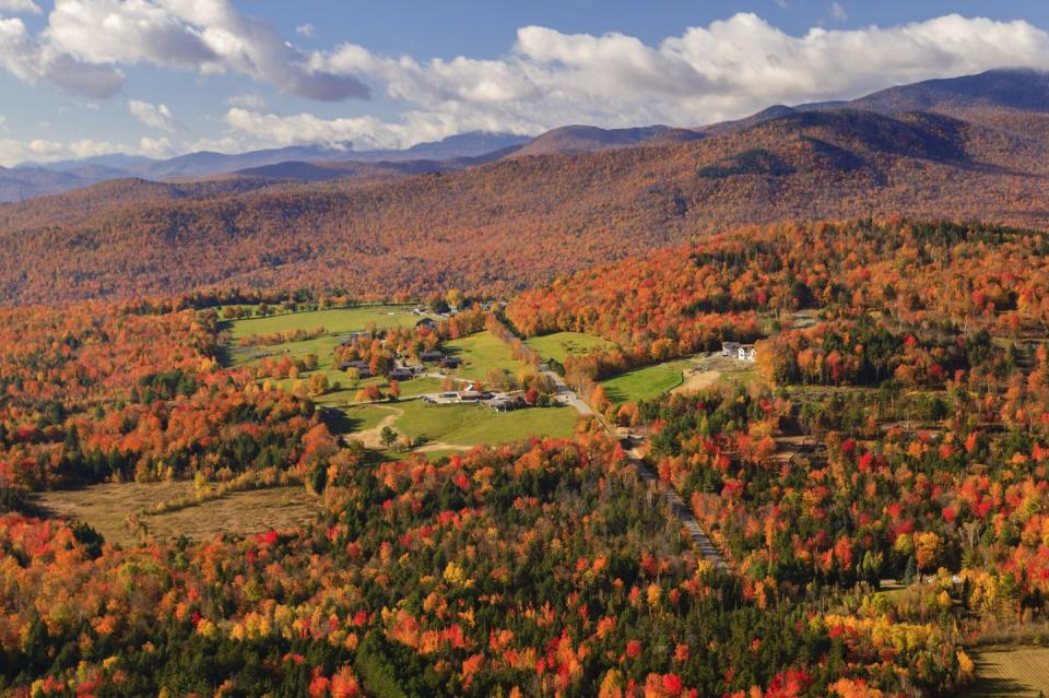 best honeymoon destinations us stowe vermont aerial view of fall foliage in stowe, vermont