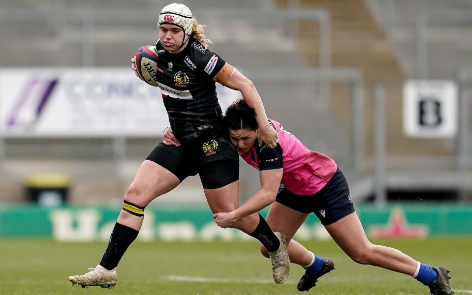 Jodie Ounsley of Exeter Chiefs is tackled by a Durham Sharks player - Meet the deaf Exeter wing turned Gladiator on the BBC