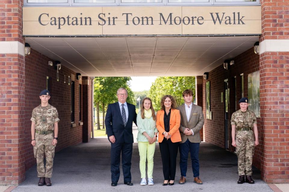 Colin Ingram-Moore (left) and Hannah Ingram-Moore (second from right) have been disqualified as charity trustees (PA Archive)