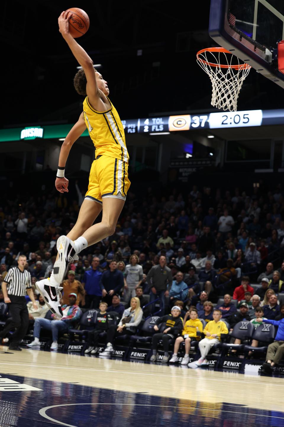 Kingston Land of Moeller dunks the ball in the third quarter against Centerville in the Division I regional final March 16, 2024. Centerville won in double overtime 70-69.