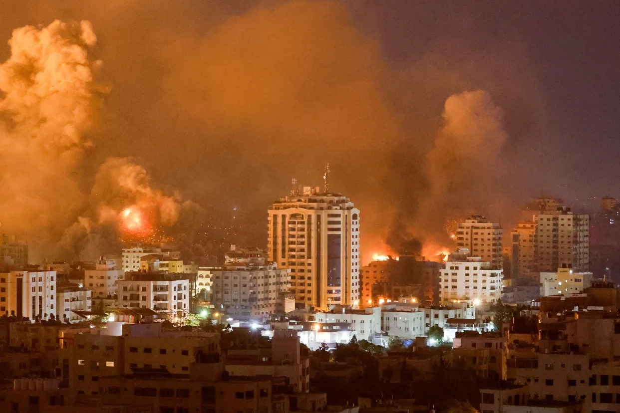Flames and smoke billow during Israeli strikes in Gaza, October 9, 2023. (Mohammed Salem/Reuters)