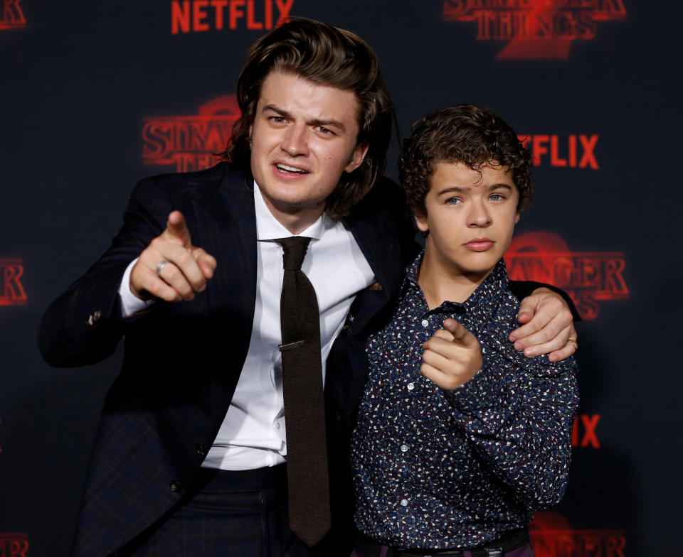 Cast members Joe Keery (L) and Gaten Matarazzo pose at the premiere for the second season of the television series "Stranger Things" in Los Angeles, California, U.S., October 26, 2017. REUTERS/Mario Anzuoni