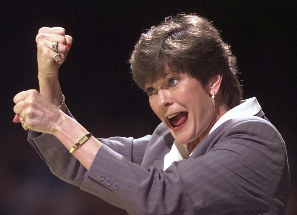 FILE - Tennessee coach Pat Summitt signals to her players in the second half of an NCAA college basketball game against Rutgers at the NCAA women's Mideast Regional in Nashville, Tenn., March 21, 1998. (AP Photo/Mark Humphrey, File)