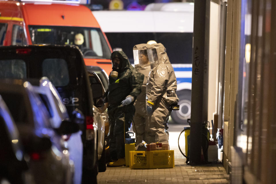 Substances found during the search are examined in Castrop-Rauxel, Sunday, Jan.8, 2023. In Castrop-Rauxel, there was a large-scale operation by the police and fire department on Saturday evening. A special task force (SEK) was also on the scene, a police spokeswoman told the German Press Agency on Saturday evening. (Christoph Reichwein/dpa via AP)