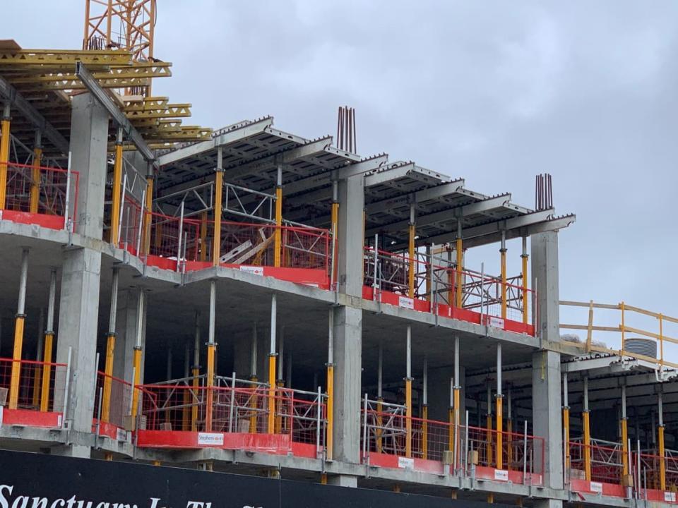 A luxury condo building under construction on Ottawa's Wellington Street W. in May 2021. (Kate Porter/CBC - image credit)