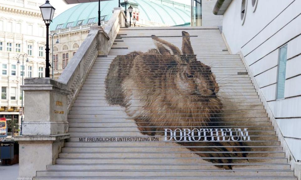 An image of Young Hare painted on the steps at the Museum Albertina.