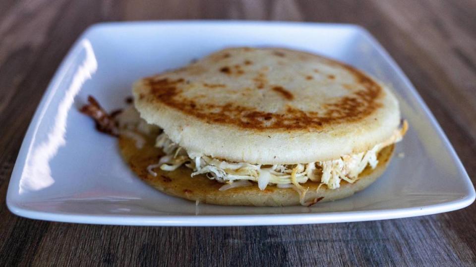 An arepa with pork from The Colombian Corner restaurant in Lawrenceburg, December 14, 2023.