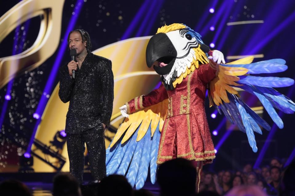 THE MASKED SINGER: L-R: Nick Cannon and Macau in the “Season Finale” episode of THE MASKED SINGER airing Wednesday, May 17 (8:00-9:01 PM ET/PT) on FOX. CR: Michael Becker/FOX. ©2023 FOX Media LLC.