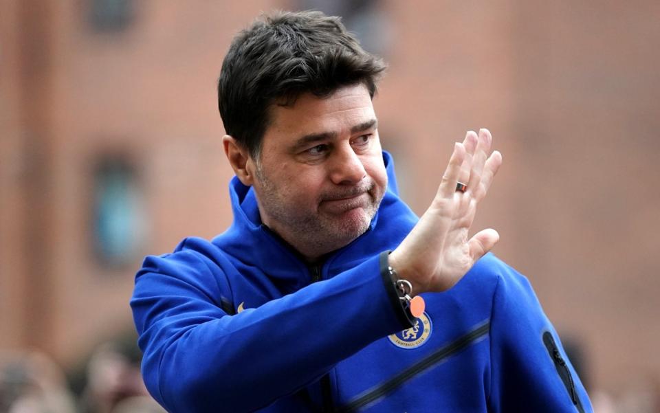 Mauricio Pochettino waves to fans at Stamford Bridge