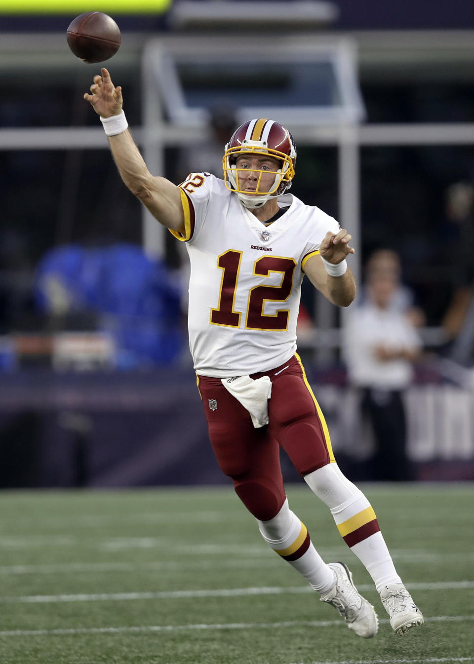 Washington Redskins quarterback Colt McCoy passes against the New England Patriots during the first half of a preseason NFL football game, Thursday, Aug. 9, 2018, in Foxborough, Mass. (AP Photo/Charles Krupa)