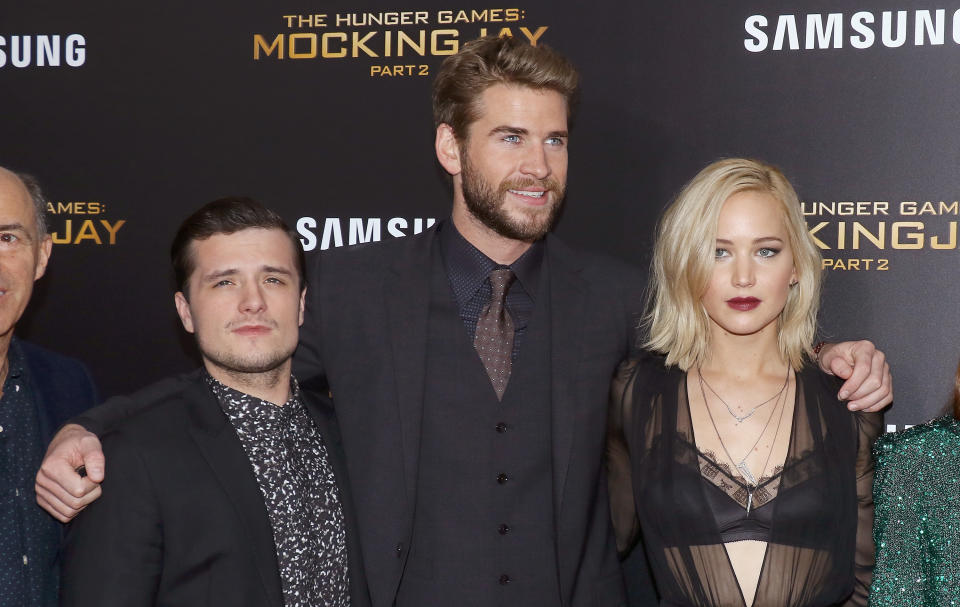 NEW YORK, NY - NOVEMBER 18:  Actors  Josh Hutcherson, Liam Hemsworth and Jennifer Lawrence attend the 