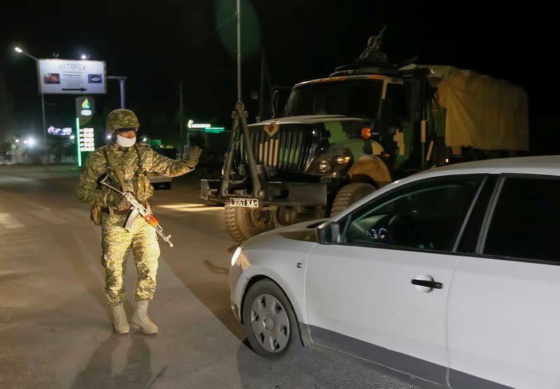 FILE PHOTO: Members of Kyrgyz armed forces are seen in the street in Bishkek